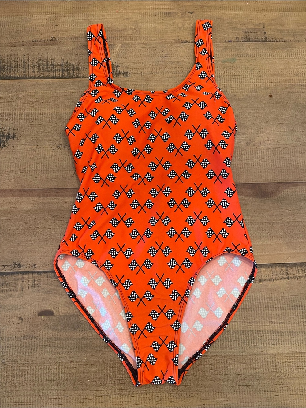 Women's Orange One-Piece Swimsuit with Checkered Flag Motif